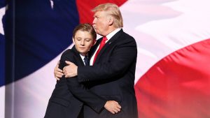 WTF!!! If any individual asks Barron Trump(Son of Donald Trump) to clean up the cow’s excrete though there is a maid to do it. Same situation appear in his life. Continue reading to know more… CLEVELAND, OH - JULY 21: Republican presidential candidate Donald embraces his son Barron Trump after he delivered his speech on the fourth day of the Republican National Convention on July 21, 2016 at the Quicken Loans Arena in Cleveland, Ohio. Republican presidential candidate Donald Trump received the number of votes needed to secure the party's nomination. An estimated 50,000 people are expected in Cleveland, including hundreds of protesters and members of the media. The four-day Republican National Convention kicked off on July 18. (Photo by John Moore/Getty Images)