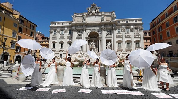 Brides-to-be stage a protest in Rome, Italy against the restrictions on ...