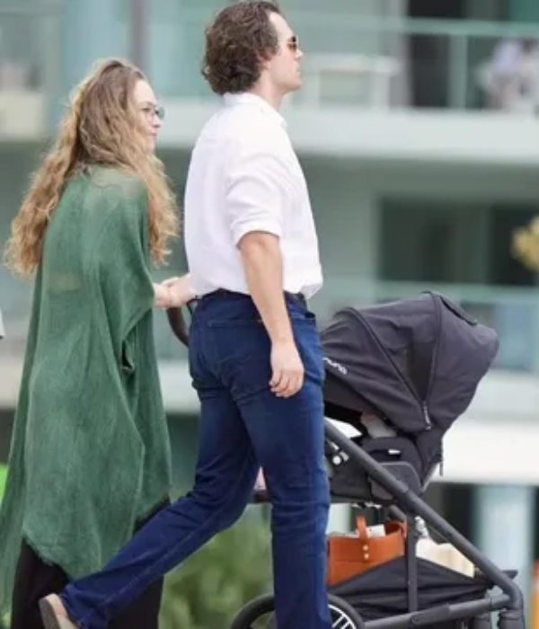 Henry Cavill and Natalie Viscuso strolling in Australia with their newborn